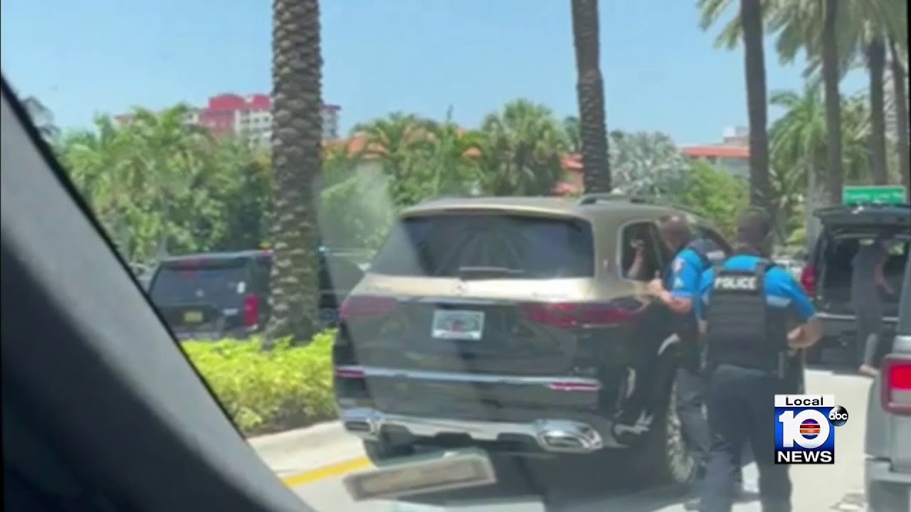 Golden Beach officers smash through windows to free unresponsive woman from SUV