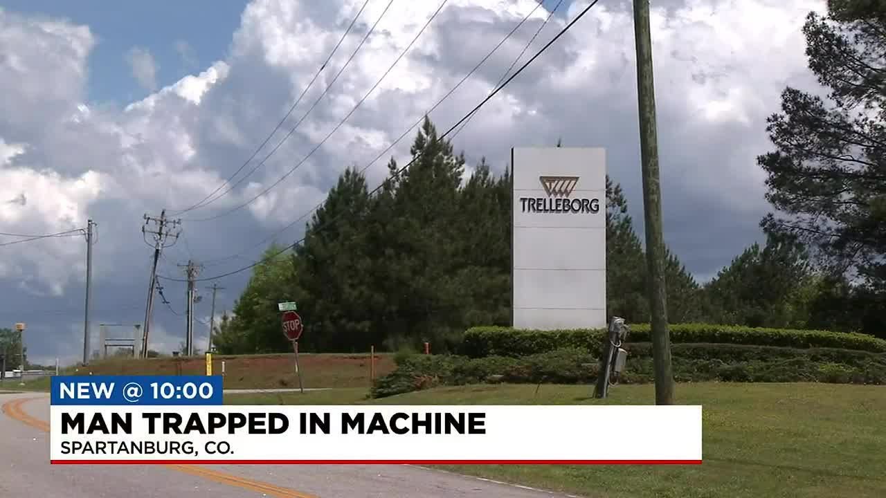 Man found trapped in machine